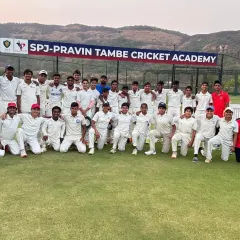 One of our boys' teams posing for a group photo after a match day, showcasing the large squad of dedicated players at our academy.