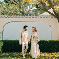 A walk in the garden, this shot captures the effortless style of the shacket ensemble. It’s perfect for a daytime wedding event.