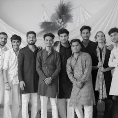 A black and white photo of some of my team members. The bond we share as a creative team is strong, and it reflects in the work we do.