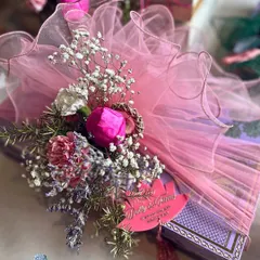 From my 'Gul & Gold' collection, this gift is wrapped in soft pink tulle and adorned with a delicate floral bouquet and a custom lotus tag. This collection is a gentle story whispered, not told, celebrating moments both timeless and bold.
