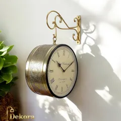 Our vintage-inspired Victoria station clock features a dual-sided face and detailed brass carving, bringing timeless elegance to your decor.