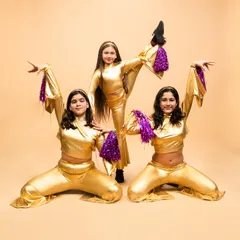 A dynamic pose from our disco fever routine. This performance showcases the flexibility and coordination our young students develop in their jazz classes.