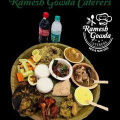 A complete non-veg oota served on a traditional banana leaf. This spread includes our signature mutton biryani, chicken fry, fish tava fry, mutton chops, and more, showing the variety we offer for a proper baadoota.