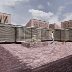 Another view of the Studio Tarai terrace, showing how the brick volumes are interwoven with lighter, screened structures. This layering of materials creates a dynamic environment that is both enclosed and open to the elements.