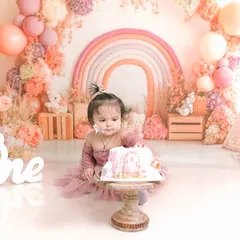 A quiet moment of contemplation before the cake smashing continues. I capture a range of emotions during these sessions, from excitement to curiosity.