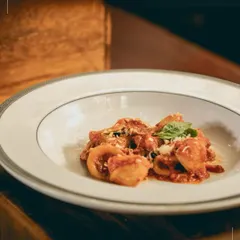 Hand folded Tortellini in a classic Pappa al Pomodoro sauce. This dish, served at a destination wedding, combines traditional Italian technique with refined plating, honouring our contemporary approach to heritage recipes.