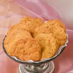 To add a modern twist to tradition, I also create flavored mathis. These savory, spiced biscuits are a signature creation, perfect for adding a unique touch to your wedding festivities.