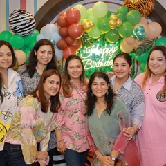 A group of moms enjoying the party. We provide a comfortable and stylish space for parents to relax, chat, and enjoy the celebration while we take care of the kids.