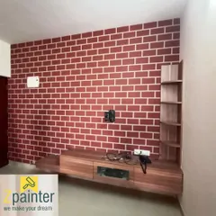 We create realistic faux brick walls for a classic industrial or rustic feel. This red brick pattern is painted as a feature wall for a TV unit, adding texture and warmth to the living area.