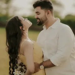 An intimate close-up capturing the chemistry between the couple. This natural light portrait focuses on their expressions and the tender connection they share.