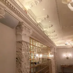 For this luxury space with ornate classical details, I used Cornered Audio C5 speakers. Their unique triangular design allows them to fit discreetly into corners, providing excellent sound without clashing with the intricate architecture.