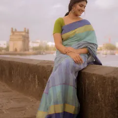 A classic portrait with the iconic Gateway of India in the background. This shot combines traditional attire with a landmark Mumbai location for a timeless feel.