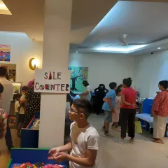 The sale counter at our exhibition was a popular spot! It's always a thrill for students to see their work being appreciated and purchased by art lovers.