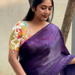 A closer look at the beautiful contrast between the deep purple saree and the colorful floral print of the blouse. This is my favorite way to style sarees, letting the blouse make the statement.