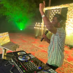Using the microphone is a key part of my set. I engage with the audience, make shoutouts, and keep the energy flowing from the first song to the last.