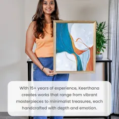 With over fifteen years of experience, I create works that range from bold, vibrant masterpieces to quiet, minimalist treasures. Here, I'm holding a smaller, framed piece that brings a subtle yet powerful energy, perfect for an intimate corner of a home.