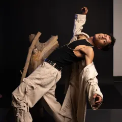 An expressive pose from a creative photoshoot. My movement background helps me create dynamic and interesting shapes for the camera.
