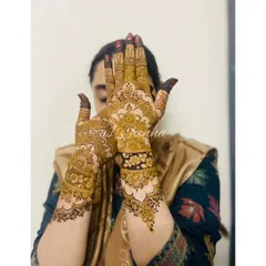 This intricate bridal design combines delicate floral bands with classic Indian mehndi motifs. My classes teach you how to create these multi-layered compositions.