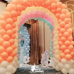 Every magical party needs a grand entrance. I constructed this multi-layered rainbow balloon arch to welcome guests into the unicorn-themed celebration, setting a fantastical tone from the very first step.