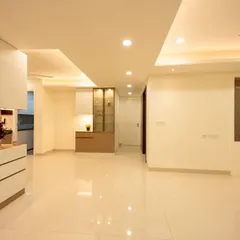 Another angle of Bhavinee's home, showing the seamless flow between different areas. The consistent color palette and lighting create a harmonious and unified feel.