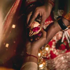 The Kanyadaan, a father's blessing. This photo captures the hands of the father and daughter during this deeply significant Hindu wedding ritual.