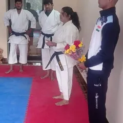 A moment of recognition for one of our senior female students. We believe in celebrating every milestone on the path of martial arts.