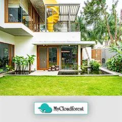 I designed this space to seamlessly blend modern architecture with the natural environment. The clean lines of the home are softened by a pristine lawn and a tranquil water feature, creating a private retreat that feels both sophisticated and serene.