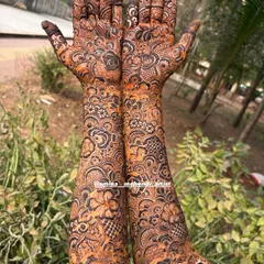 The beauty of a full coverage design is how it flows seamlessly from the palm to the arm. This piece is packed with paisleys, flowers, and checkerboard fills.