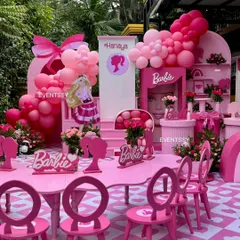 Another wide shot of the Barbie setup, showing the layout of the main stage, dessert tables, and kids' seating area.