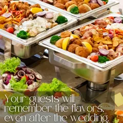 Your guests will remember the flavors long after the wedding. This image shows a variety of our buffet dishes in chafing trays, ready to be served at a grand celebration.