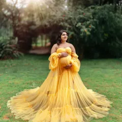 Bathed in the warm glow of the golden hour, this outdoor maternity photo captures pure joy. I love using natural light in parks and gardens around Bangalore to create these radiant pregnancy portraits.