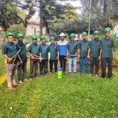 Another photo of our hardworking team in a garden we maintain. We work together to ensure every detail is taken care of.