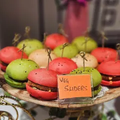 My colorful mini veg sliders are always a party favorite. These bite-sized burgers are not just delicious but also a feast for the eyes, perfect for guests to enjoy while mingling.