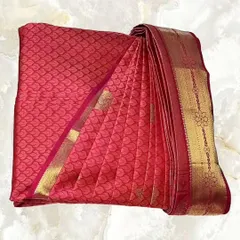 A vibrant pink Kanjeevaram, expertly pleated and boxed. This service is a game-changer for brides who want to focus on their memories, not on draping their saree.