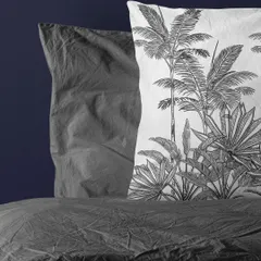 My Madagascar-inspired botanical print on a pillowcase. The clean black and white line work adds a touch of sophisticated, natural charm to bedding and home decor.