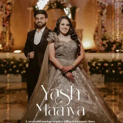 Seeing my clients shine on their special day is the best part of my job. Here's a happy couple at their reception. The groom is wearing a custom-tailored dark three-piece suit with subtle embroidery on the jacket, perfectly complementing the bride's gown.