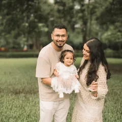 All smiles for the camera! This is a classic family portrait that they will cherish for years to come.