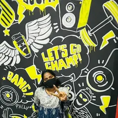 Here I am with a finished wall doodle for a gym in Bengaluru. This high-energy, graphic style is perfect for motivating spaces, using bold typography and pop-art illustrations to make a powerful statement.