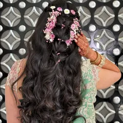 Another angle of the floral cascade braid, showing how the flowers are woven through the hair to create a beautiful, organic design.