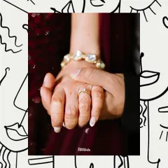 A creative shot of the couple holding hands, framed by modern line art. This image focuses on their connection amidst the energy of the reception party.