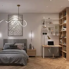 A serene bedroom that incorporates a dedicated study area. The custom bookshelf and desk unit in natural wood tones provide a beautiful and practical workspace without compromising the room's restful atmosphere.