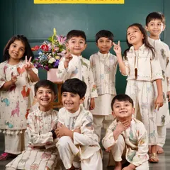 A happy group of children wearing my whimsical animal-print collection. I designed these kurtas and co-ord sets to be fun, comfortable, and perfect for playdates and parties.