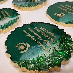 A set of green and gold geode style magnets, customized for Daniel Stephen's Holy Communion.