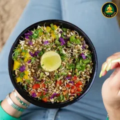 A salad should be a rainbow of nutrients. This sprout salad is packed with colorful bell peppers, red cabbage, and fresh herbs, all brought together with a zesty squeeze of lime.