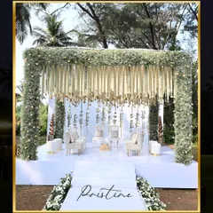 This pristine white mandap at ITC Goa was designed for an ethereal, heavenly feel. The clean lines and lush white florals create a serene and elegant space for exchanging vows.