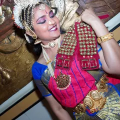 Capturing the expressive storytelling of a classical dancer. This candid moment shows the emotion and dedication the artist puts into her performance.