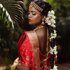The elegance of a traditional South Indian bride. I ensured her skin had a dewy, almost luminous quality to it, which photographs beautifully against the lush green background.
