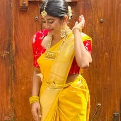 Embracing the vibrant energy of Day 1 of Navratri in this stunning yellow saree. The color of joy and positivity to light up the divine nights.