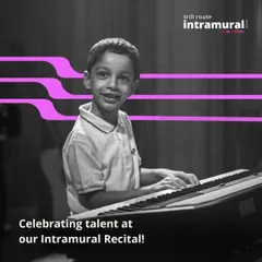 A smile that says "I did it!" A young student beams with pride after his keyboard performance at our Intramural Recital. This is the moment all the practice pays off.