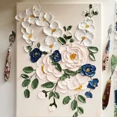 Experience the satisfaction of creating art with dimension. This floral piece was made using texture painting techniques, where you learn to build layers with a palette knife to make flowers that literally pop off the canvas.
